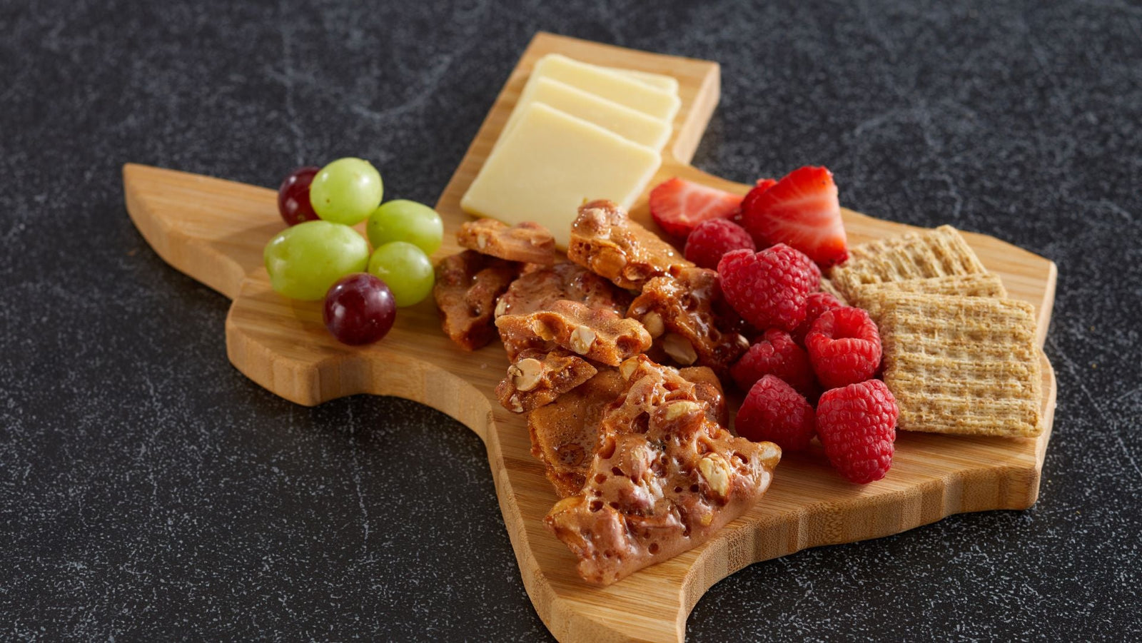 State of Texas Cutting Board with Brittle, Cheese, Crackers and Fruit