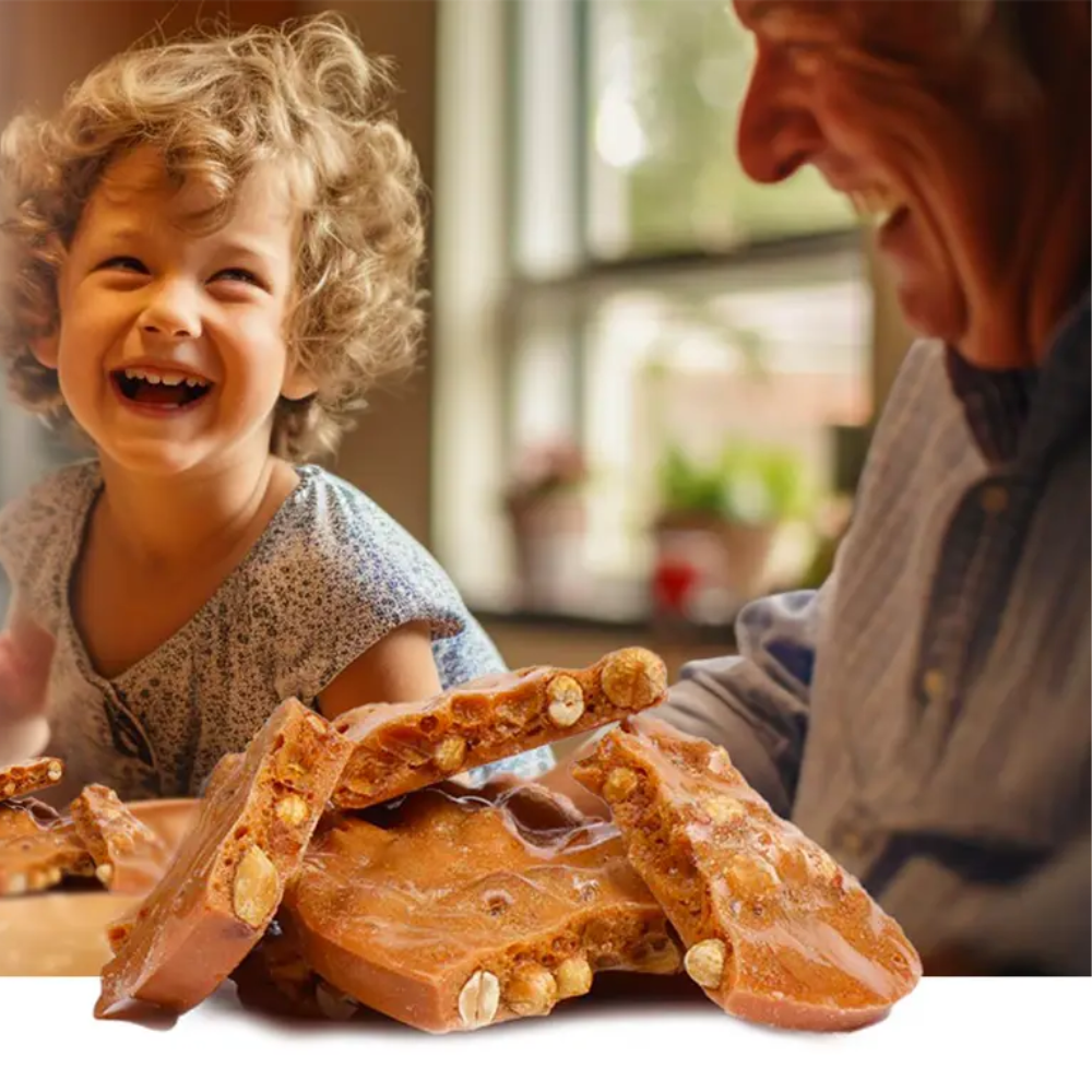 child smiling at the thought of eating peanut brittle