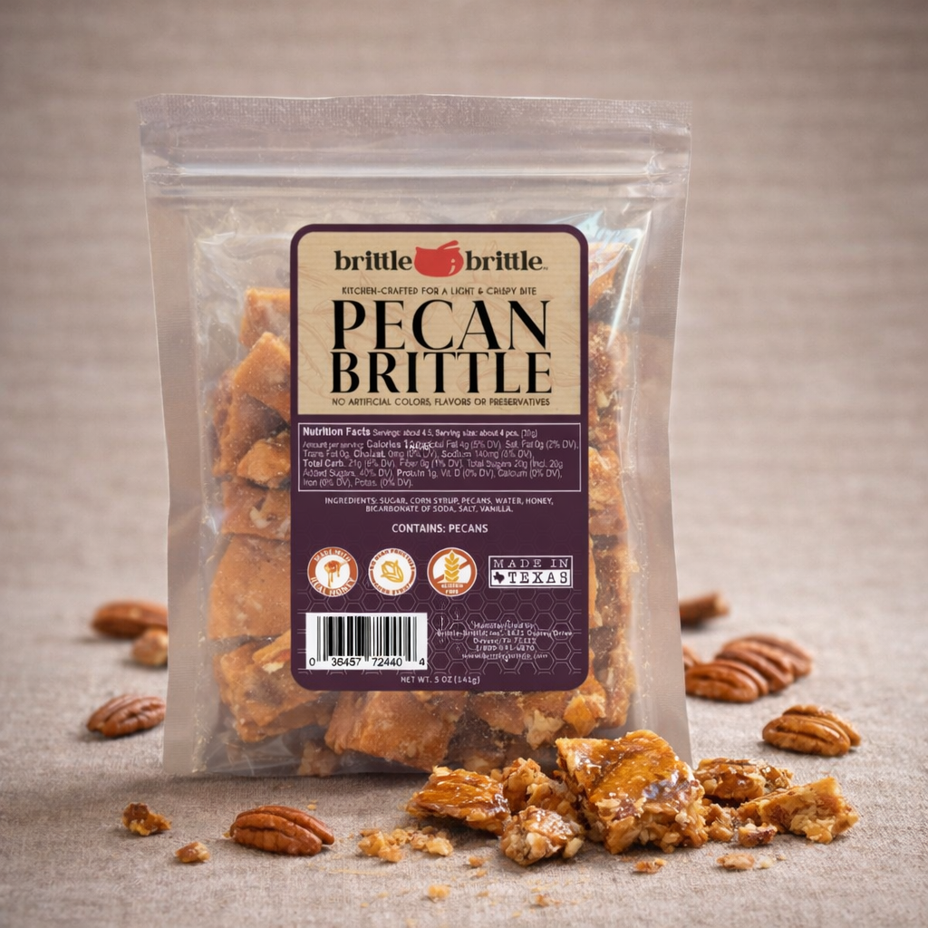 Packaged pecan brittle with a visible brand label on a neutral background